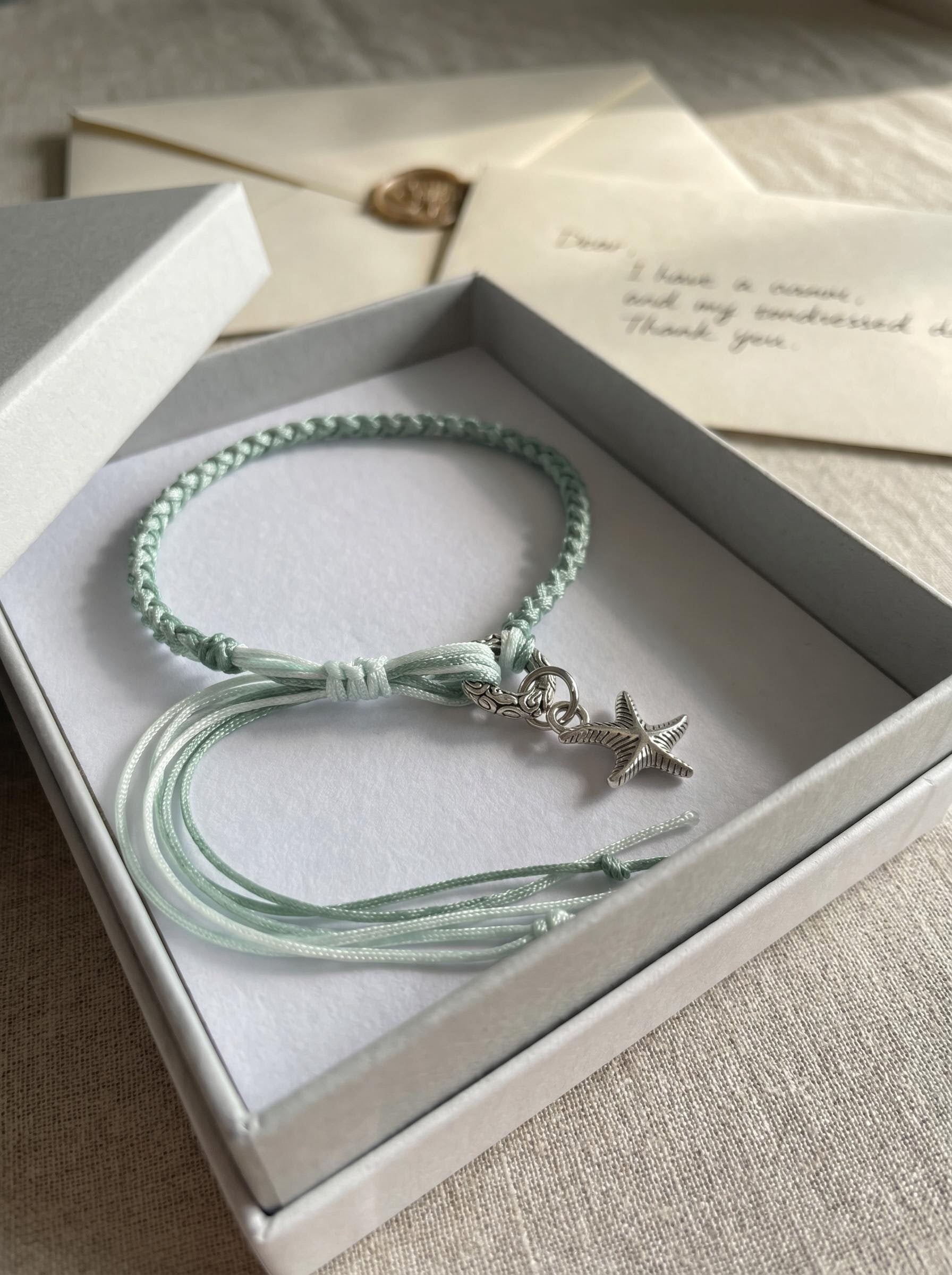 ORIENTAL VIBE | Grain Rain Hand-Woven Dragon Scale Bracelet with Engraved Antique Silver Ring & Starfish Charm, Long Tassel Accent, Adjustable