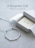 ORIENTAL VIBE | Light Snow Handcrafted Dragon Scale Bracelet Adorned with Multiple Silver-Toned Star Charms, Adjustable Drawstring