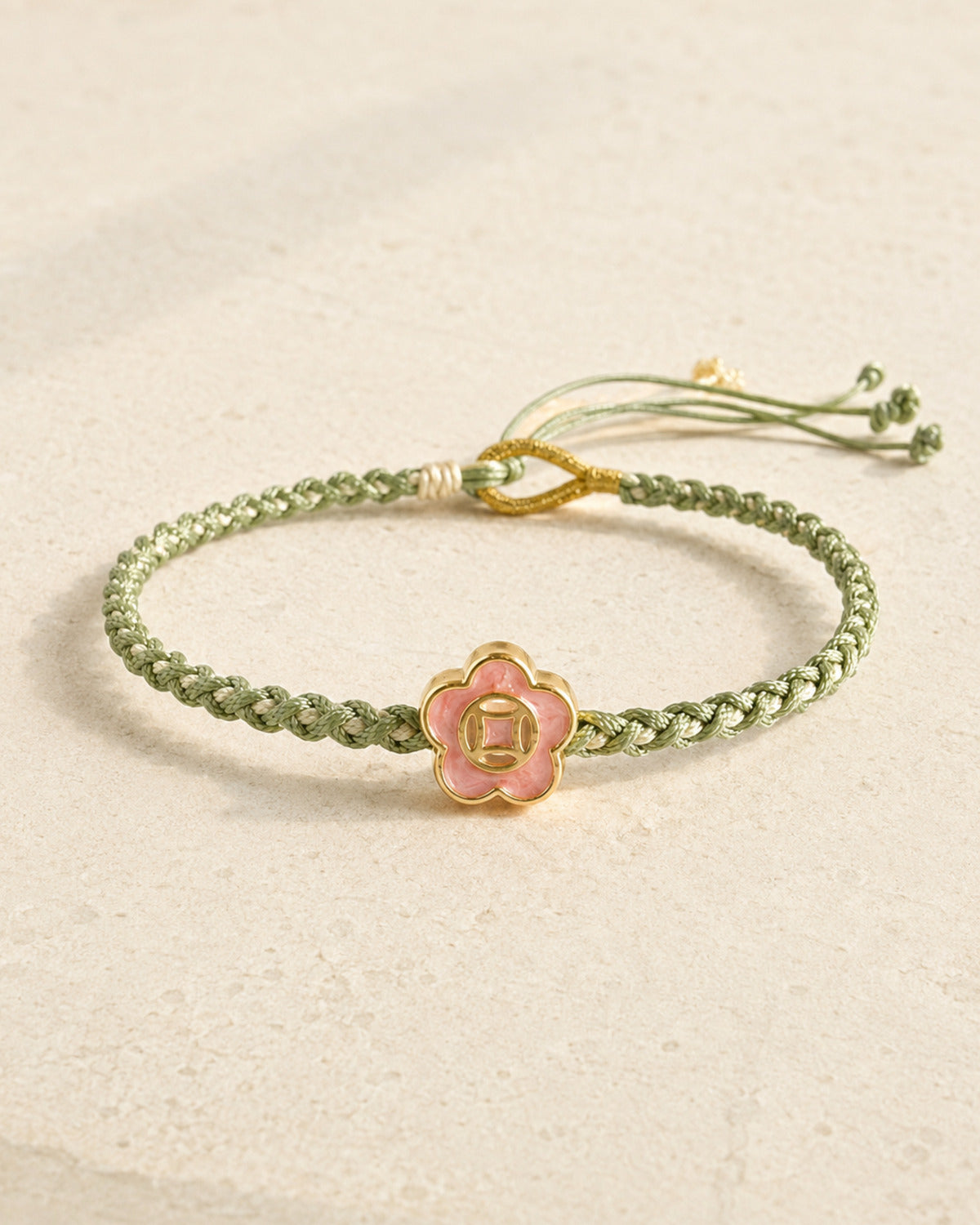 24 Solar Terms handwoven bracelet on a warm ivory textured background